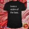 Official I Was A Victim Of The Bass shirt optimized, featuring bold text on a comfortable cotton tee