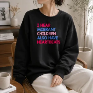 Awesome I Hear Migrant Children Also Have Heartbeats Sweater in cozy knit fabric, displayed on a plain background