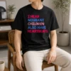 Awesome I Hear Migrant Children Also Have Heartbeats T Shirt in black, front view with bold white text